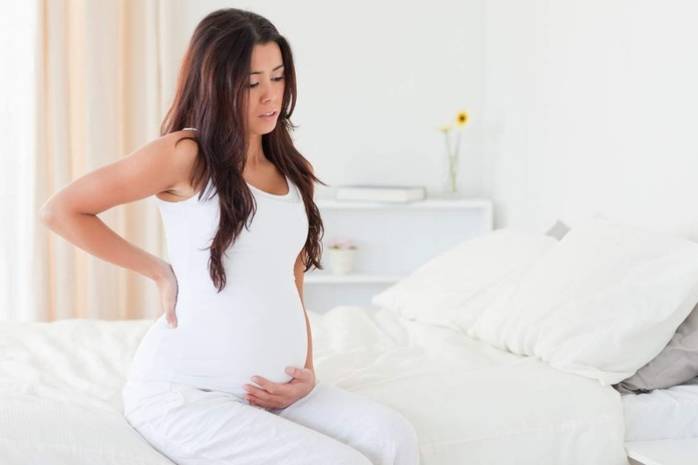 Спина болит в области поясницы с постели встать не могу