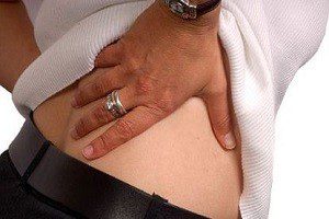 что может болеть внизу справа со стороны спины