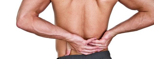 почему при приседаниях болит спина