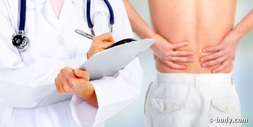 почему при приседаниях болит спина